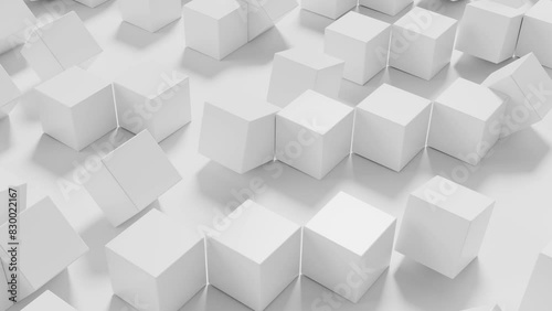 White cubes roll on a white background. Looped animation. photo