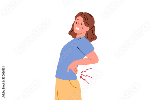 Obraz na płótnie Woman suffers from pain in spine and needs massage or warming ointment to combat radiculitis. Young girl feels sharp attack of radiculitis caused by sedentary work or lifting heavy objects. w salonie