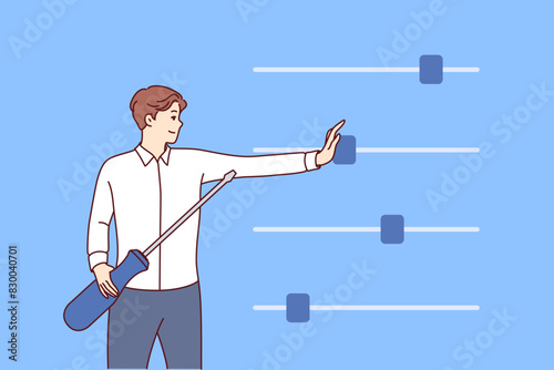 Man manages business using configuration sliders to control processes of executing plans. Guy with screwdriver configures electronic device through configuration panel with controllers