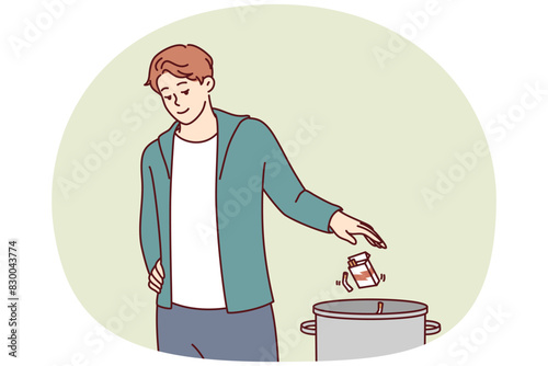 Man throws pack of cigarettes into trash can after quitting bad habit of smoking that causes cancer. Guy quits smoking and wants to start healthy lifestyle without dependence on nicotine or tobacco