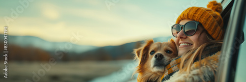 Cheerful lady and her furry friend start a thrilling road journey  photo