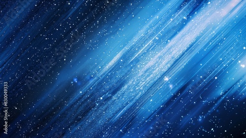 Gradient background from indigo to pale blue light streaks and sparkles evoking a winter night backdrop photo