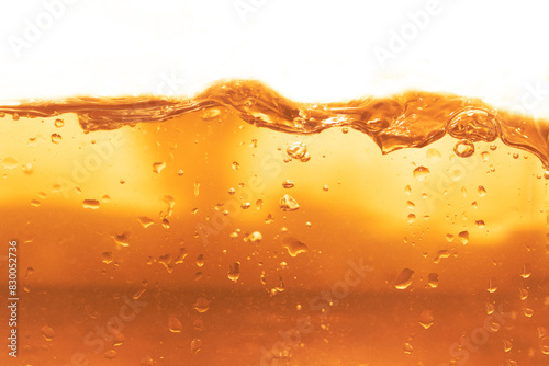 Orange water or juice and splash waves for nature