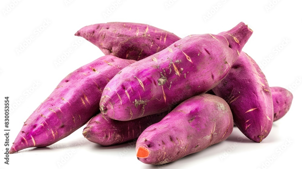 Sweet Potatoes in a Purple Hue Against a White backdrop Sweet Potatoes in a Purple Hue Against a White backdrop
