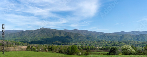 A popular scenic drive along the Cades Cove Loop Road offers a breathtaking panoramic view of the valley and mountains in the Great Smoky Mountains National Park. Photographed in spring.