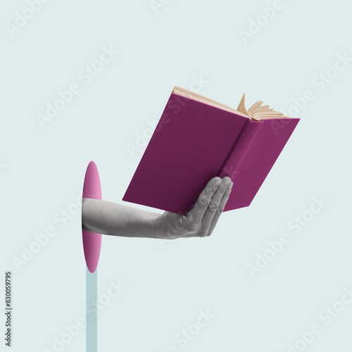 Obraz na płótnie Open book in hand on blue background.