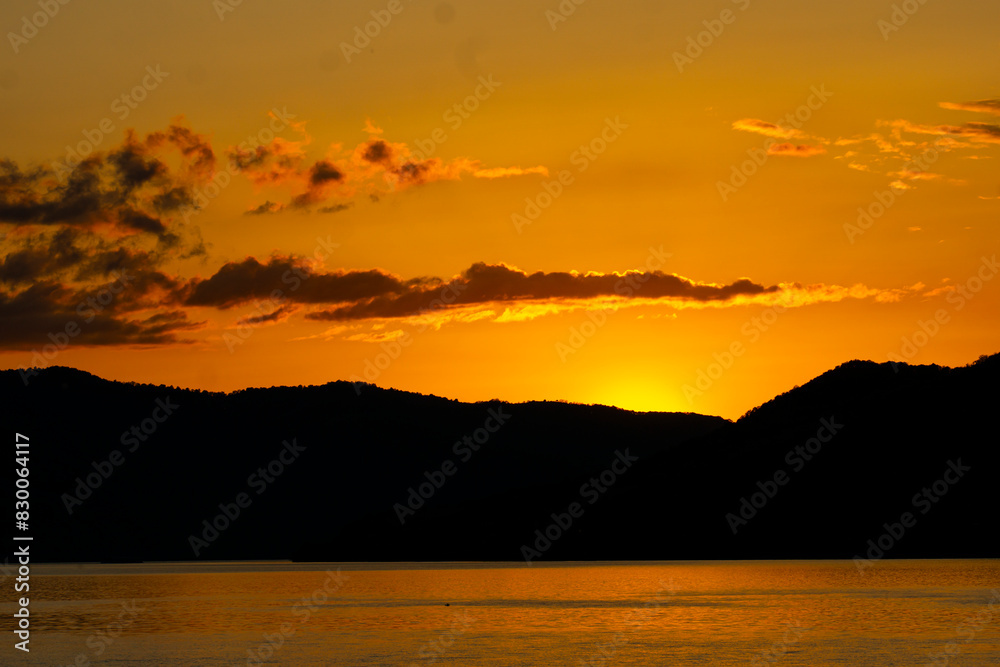 Breathtaking sunset over Djerdap gorge on the Danube river in Serbia Breathtaking sunset over Djerdap gorge on the Danube river in Serbia