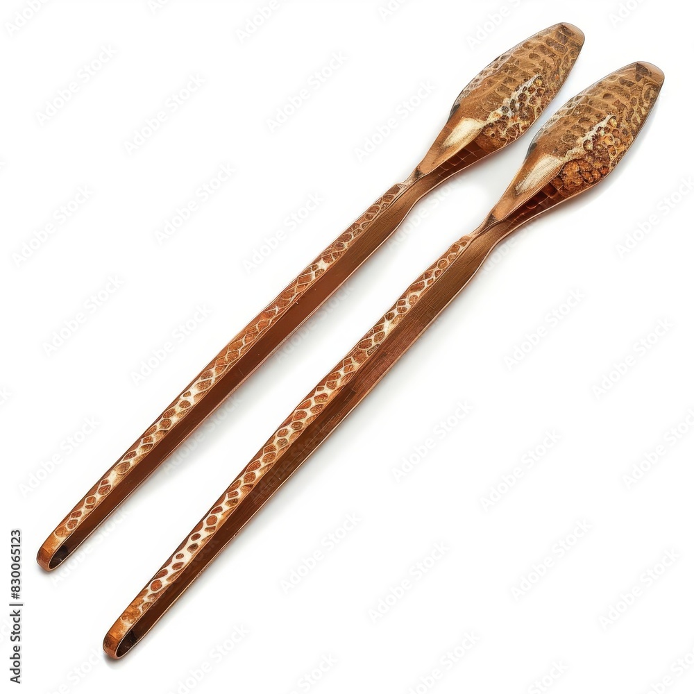 Copper tongs with a hammered finish and comfortable grip, isolated solid white background Copper tongs with a hammered finish and comfortable grip, isolated solid white background