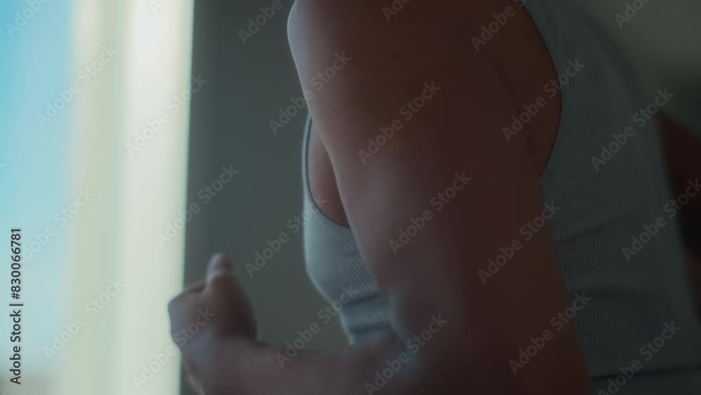Close up of a young man exercising on a treadmill at home. Healthy lifestyle and sport. Slow motion. Close up of a young man exercising on a treadmill at home. Healthy lifestyle and sport. Slow motion.