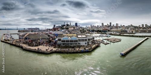 Obraz na płótnie Stunning aerial panorama of Pier 39 in San Francisco, capturing the lively waterfront with its iconic sea lion docks and bustling tourist attractions. w salonie