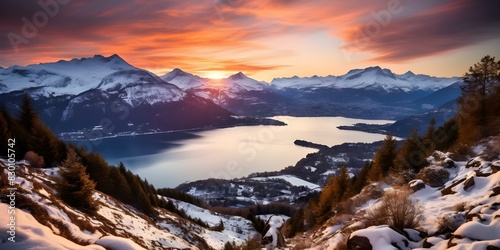 Sunset over Lake Annecy in HauteSavoie surrounded by sno. Concept Nature, Landscape, Sunset, Lake Annecy, Haute-Savoie