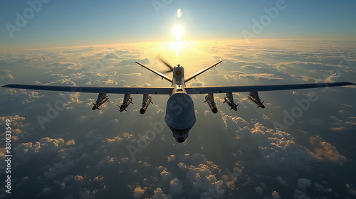 Big military combat drone with bombs flying above the clouds on background with sun. Unmanned Aerial Vehicle