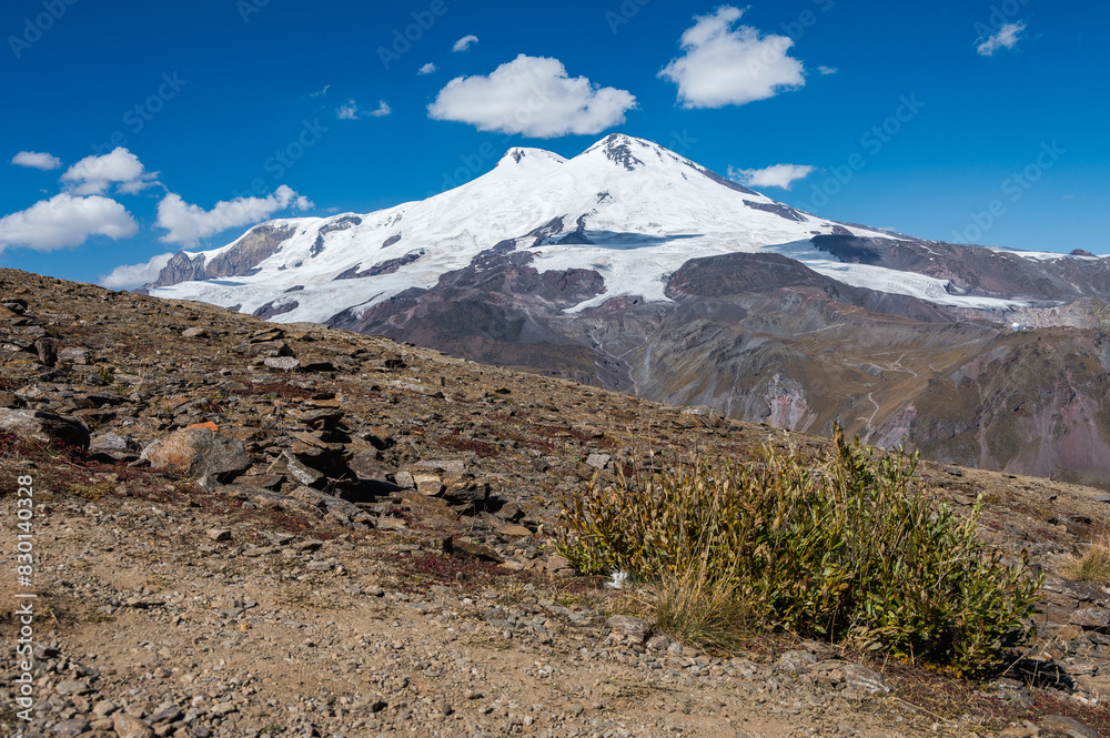 Snowy peak of Mount Elbrus in spring. Caucasus mountains. Kabardino-Balkaria Reublic. Panorama of Elbrus. Snowy peak of Mount Elbrus in spring. Caucasus mountains. Kabardino-Balkaria Reublic. Panorama of Elbrus.