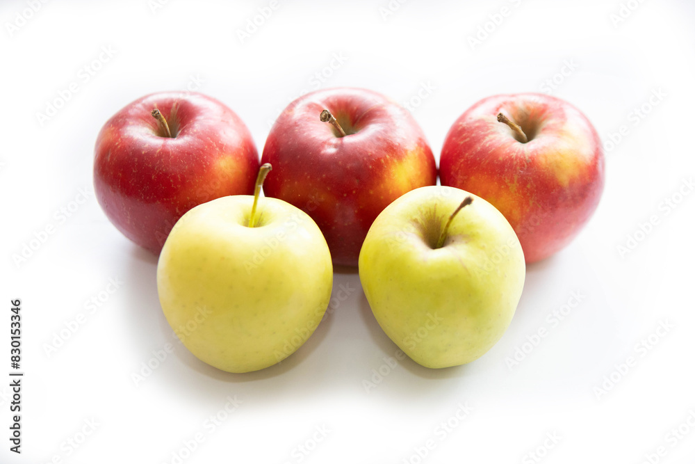 red and yellow apples on a white background red and yellow apples on a white background