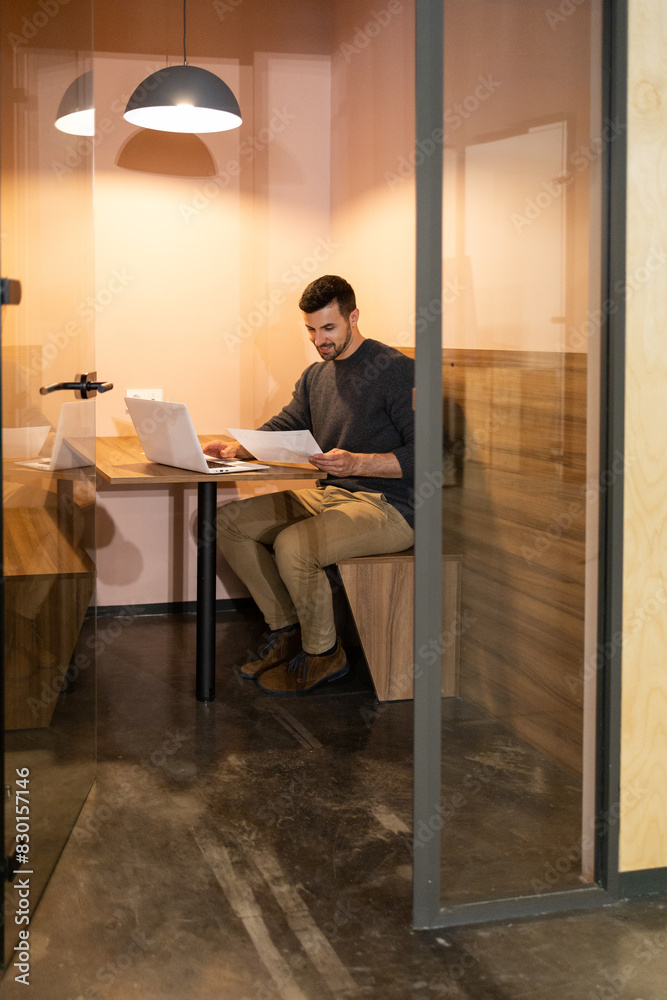 Man working solo in modern coworking space