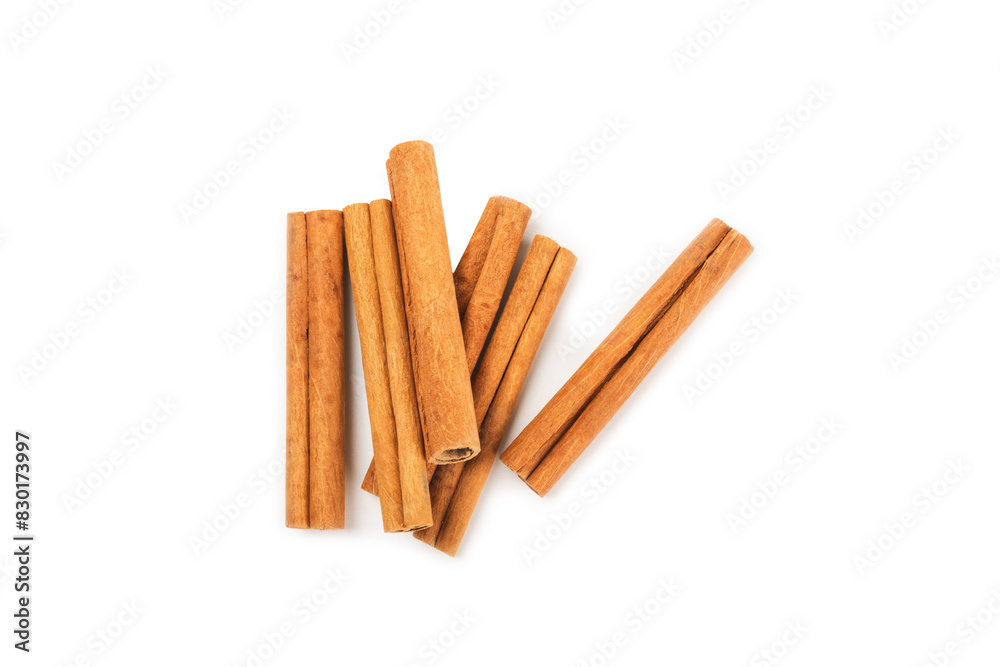 Cinnamon sticks isolated on white background. Cinnamon roll. Spicy spice for baking, desserts and drinks. Fragrant ground cinnamon. Cinnamon sticks isolated on white background. Cinnamon roll. Spicy spice for baking, desserts and drinks. Fragrant ground cinnamon.