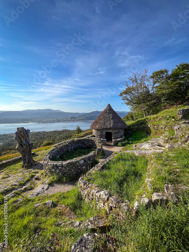 Ruins of ancient celtic settlement stone dwellings in mount of Santa Tecla archaeological site, Pontevedra, Spain