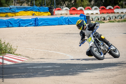 Motorcycle Racer on Track Cornering