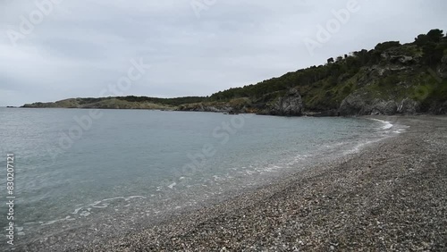 slow motion Calm sea on Garbet Colera beach Girona Spain Costa Brava on the Mediterranean coast photo