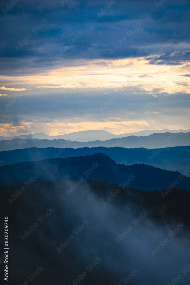 Fototapeta premium sunset over the mountains