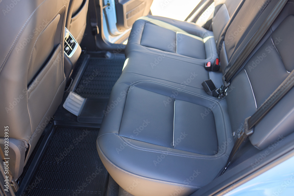 Car back seat with headrest and arm rest, a comfortable automotive fixture