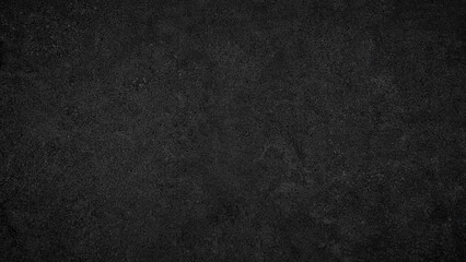 A black background with no visible objects. The background is dark and has a rough texture. It is a simple and minimalistic design