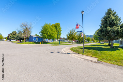Fototapeta Naklejka Na Ścianę i Meble -  A manufactured mobile home park housing community in the rural small town of Post Falls, Idaho, USA, a neighbor to, and considered part of the general Coeur d'Alene region.