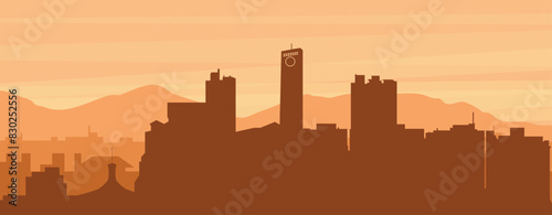 Brown panoramic poster of the city skyline with misty background buildings, sunrise, clouds and mountains of BARQUISIMETO, VENEZUELA