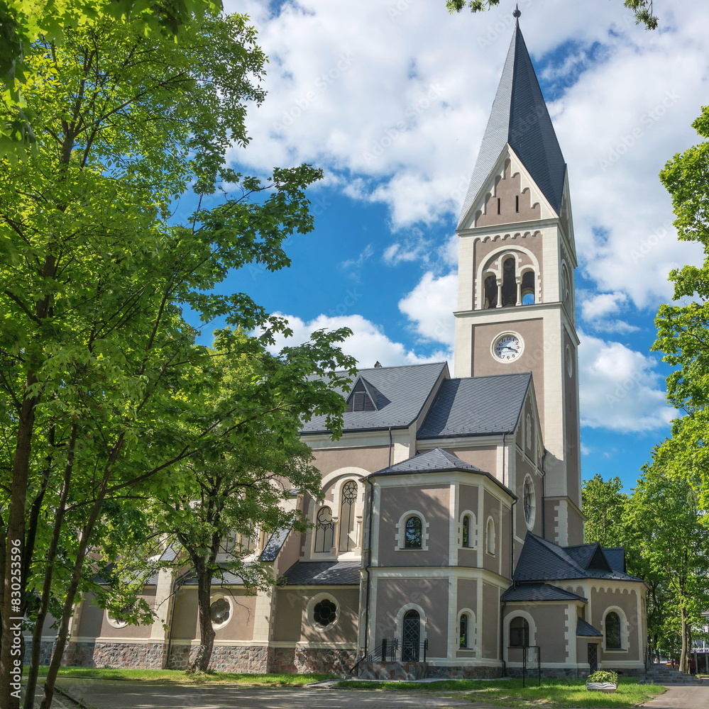 Fototapeta premium The ancient Lutheran Church in the park