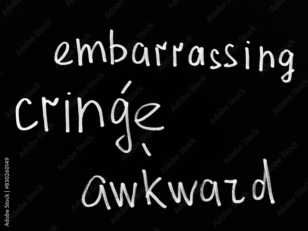 word-cringe-written-on-a-sheet-of-black-paper-various-words-and