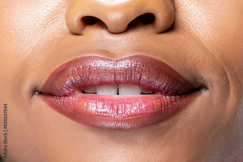 Obraz premium lips of a woman giving a kiss, perfect lips, glamour makeup, closeup on lipstick