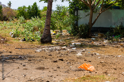 Trash littering the backstreets of the popular tourist island of Gili Trawangan in Indonesia photo