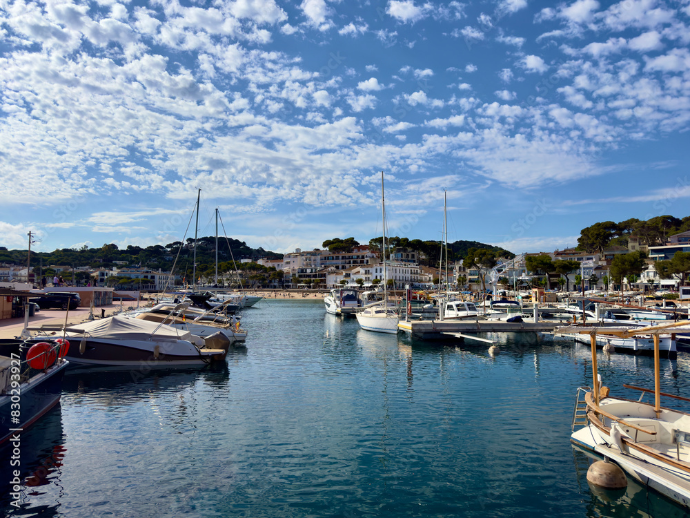 view over the port with yachts towards the beautiful bay of Llafranc, Camí de Ronda, Costa Brava, Girona, Catalonia, Spain view over the port with yachts towards the beautiful bay of Llafranc, Camí de Ronda, Costa Brava, Girona, Catalonia, Spain