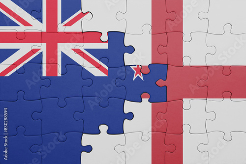 puzzle with the colourful national flag of england and flag of new zealand.