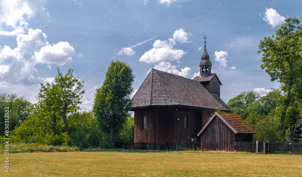 Old wooden catholic church (Kościół Rzymskokatolicki pw. św. Mikołoja) in Słopanowo ,a village in the administrative district of Gmina Obrzycko, within Szamotuły County, Greater Poland (Wielkopolska)