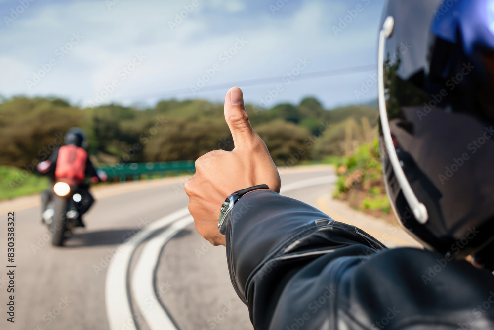 a rider making thumb up, thumbs up a rider making thumb up, thumbs up