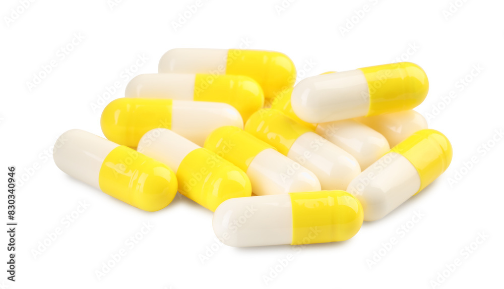 Many antibiotic pills isolated on white. Medicinal treatment Many antibiotic pills isolated on white. Medicinal treatment