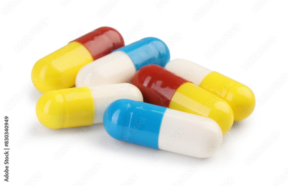 Many antibiotic pills isolated on white. Medicinal treatment Many antibiotic pills isolated on white. Medicinal treatment