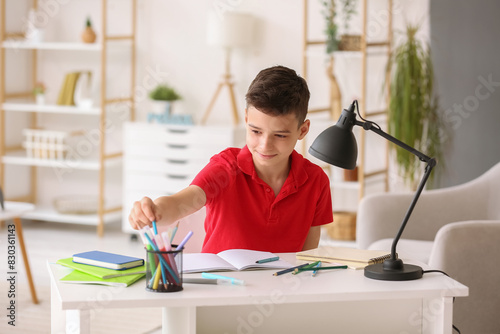 Little boy doing lessons at...