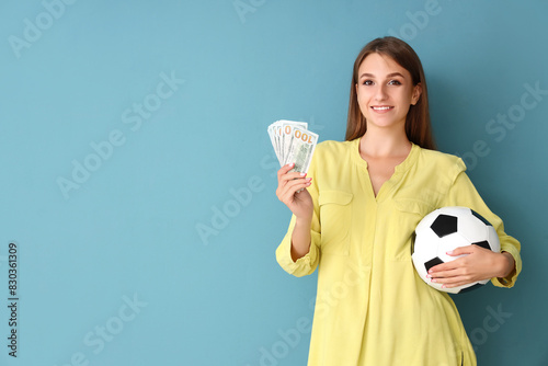 Young woman with soccer bal...