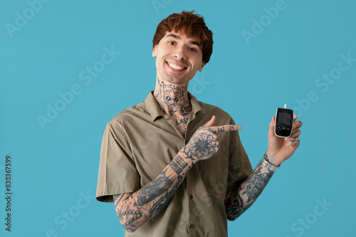 Diabetic young man pointing...
