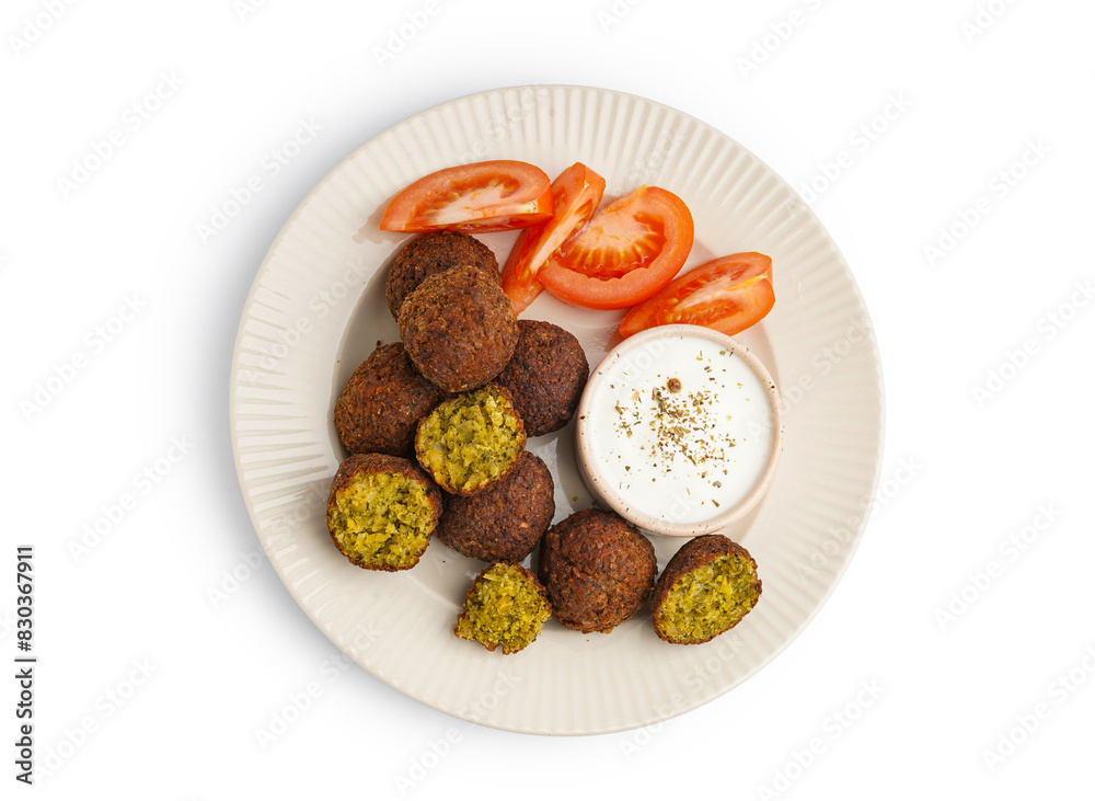 Plate with delicious falafel balls, sauce and tomatoes on white background Plate with delicious falafel balls, sauce and tomatoes on white background