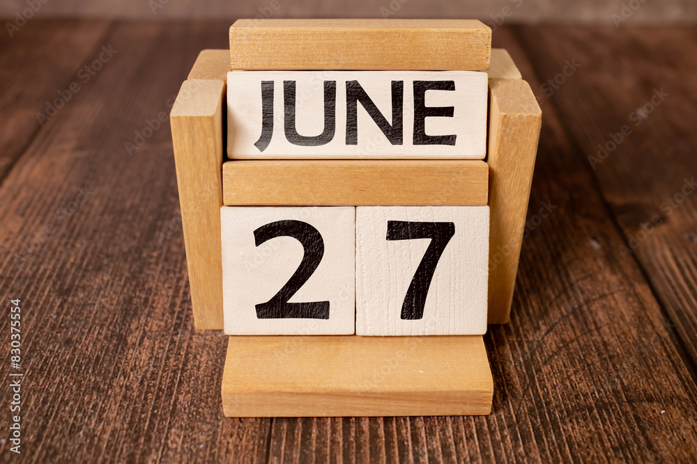 27 june wooden calendar in white background 27 june wooden calendar in white background