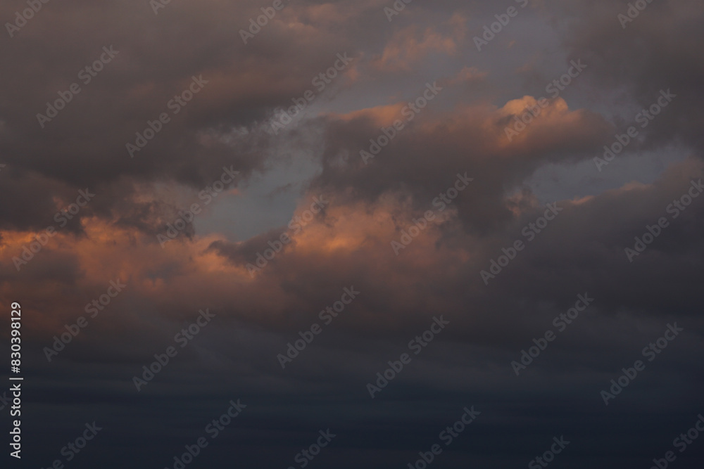 Rain clouds in the setting sun Rain clouds in the setting sun