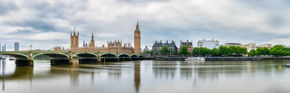 Big Ben and Westminster parliament with reflections in river Thames. London. Great Britain