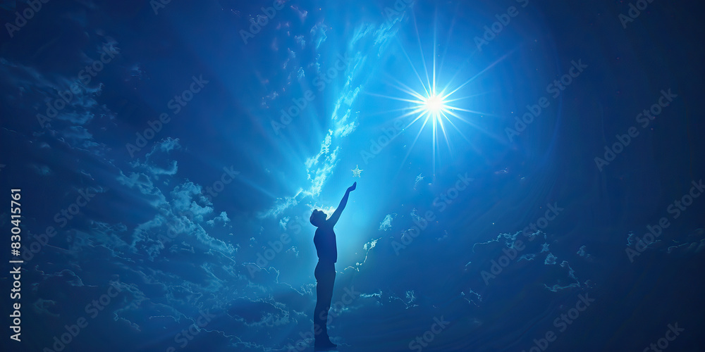 Hope (Light Blue) evokes a powerful emotion and resonates with many individuals. In this photo, a figure is stretching towards a gleaming star, personifying the yearning