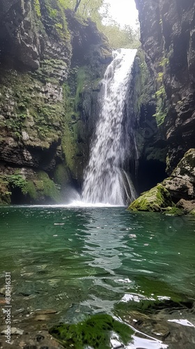 A majestic waterfall cascading down moss-covered rocks generated by AI