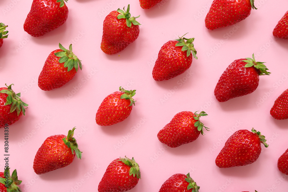 Many sweet fresh strawberries on pink background