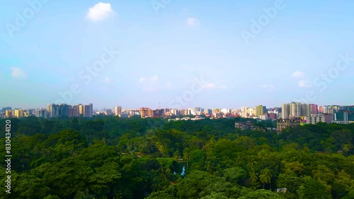 Cityscape Of Dhaka Seen From Ramna Park In Bangladesh - Drone Ascending photo