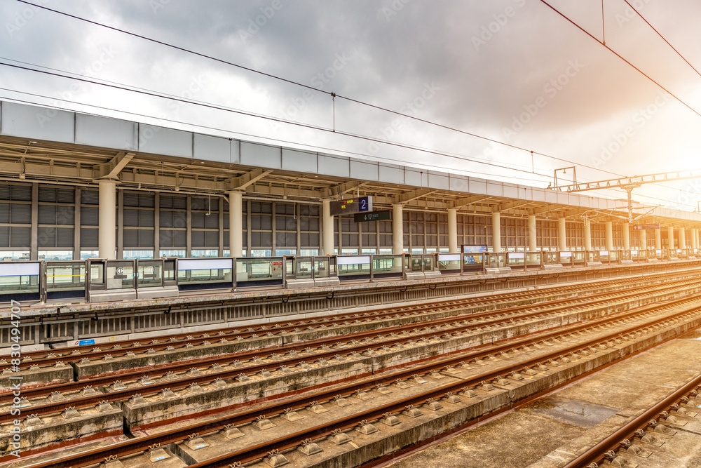 High speed intercity trains departing under the sunshine High speed intercity trains departing under the sunshine
